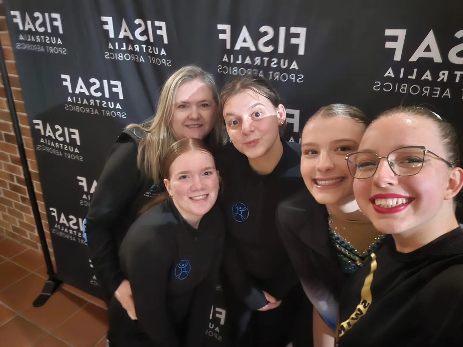 aerobics-team-posing-backstage