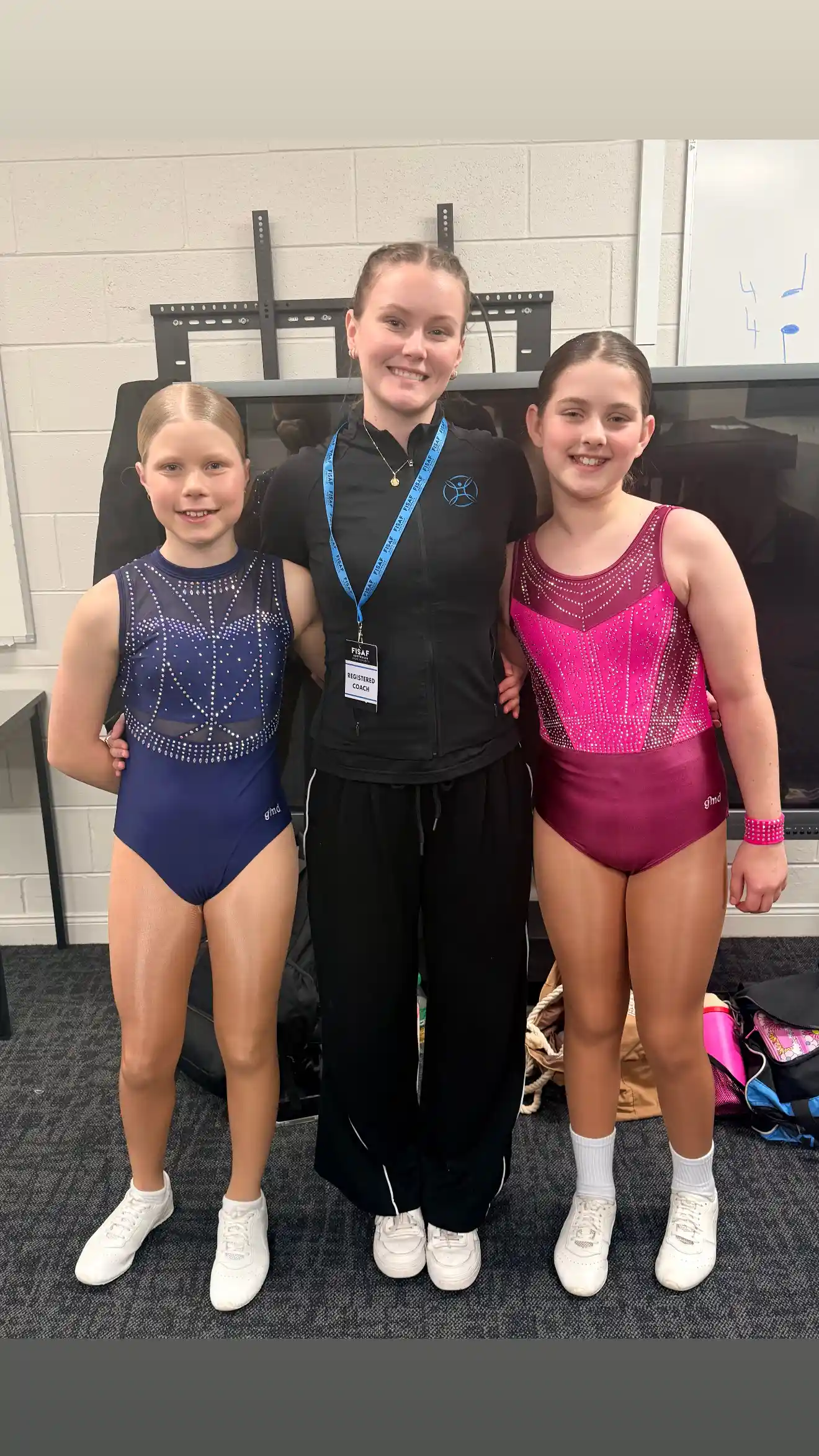 gymnasts-smiling-indoor-photoshoot